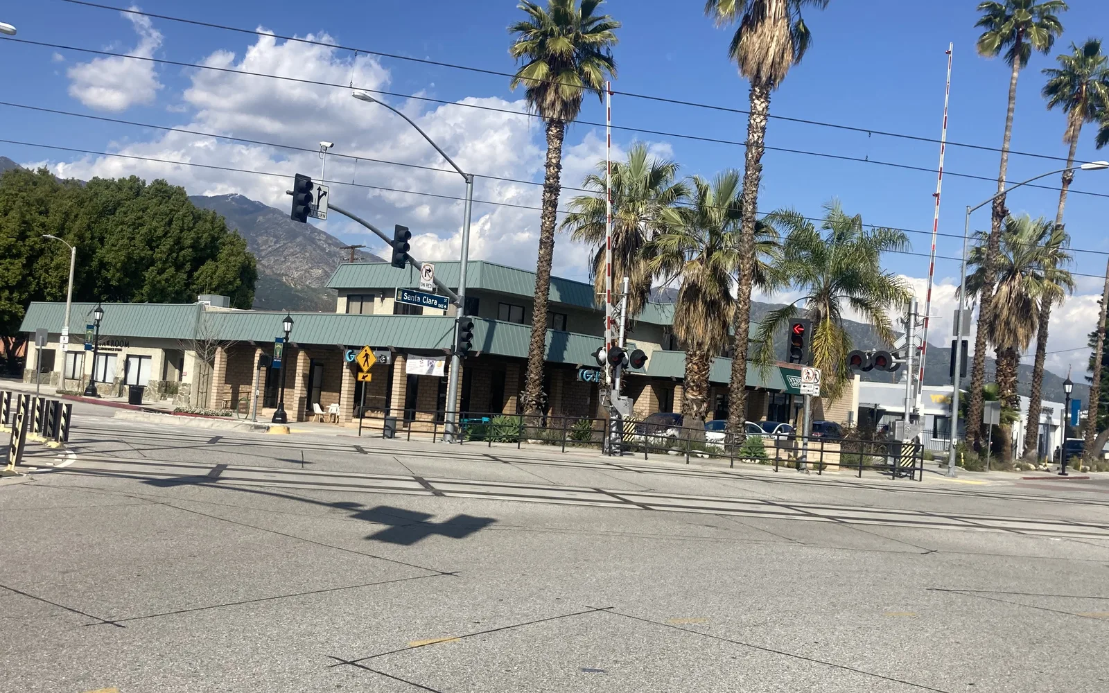Community shopping center in the San Gabriel Valley with suburban development in the background